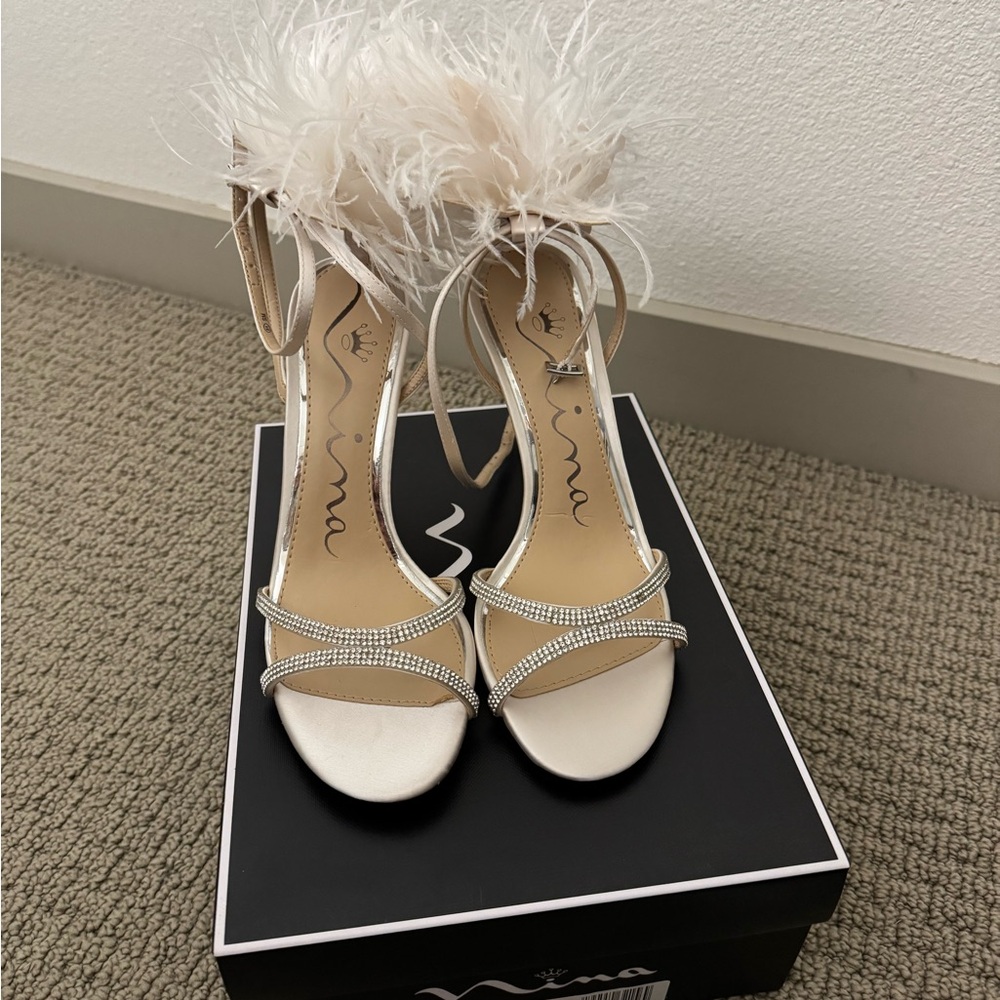 Nina Size 8 ivory heels with crystal and feathers